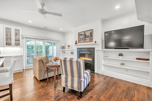 2180 Kings Hwy Unit 1, Fairfield, CT 06824 - living room with crown molding, a glass covered fireplace, wood finished floors, a ceiling fan, and recessed lighting