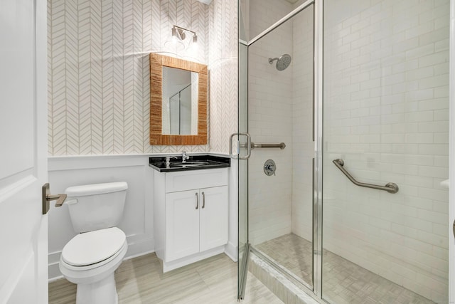 2180 Kings Hwy Unit 1, Fairfield, CT 06824 - bathroom with vanity, a shower stall, and toilet
