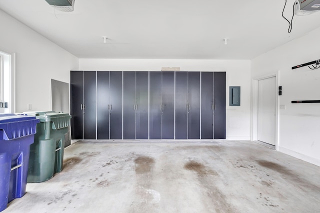2180 Kings Hwy Unit 1, Fairfield, CT 06824 - garage with electric panel and a garage door opener