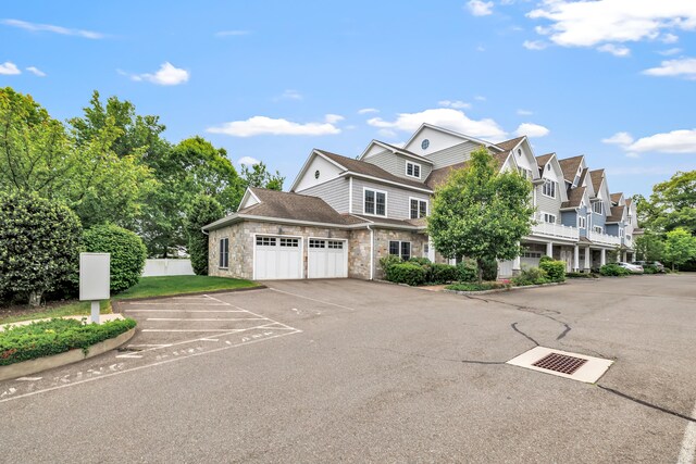 2180 Kings Hwy Unit 1, Fairfield, CT 06824 - view of front of home with a residential view and stone siding