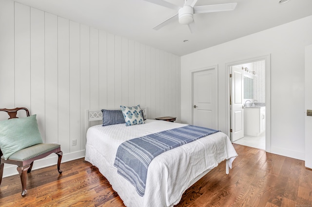 2180 Kings Hwy Unit 1, Fairfield, CT 06824 - bedroom featuring wood finished floors, baseboards, a ceiling fan, and ensuite bath