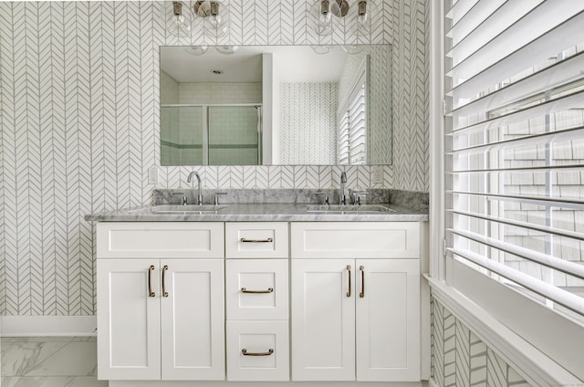 2180 Kings Hwy Unit 1, Fairfield, CT 06824 - bathroom with a shower stall, double vanity, wallpapered walls, and marble look tiles