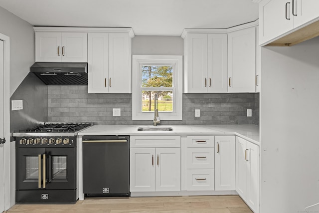 32 Porterbrook Ave, East Hartford, CT 06118 - kitchen with dishwasher, ventilation hood, gas stove, a sink, and white cabinetry