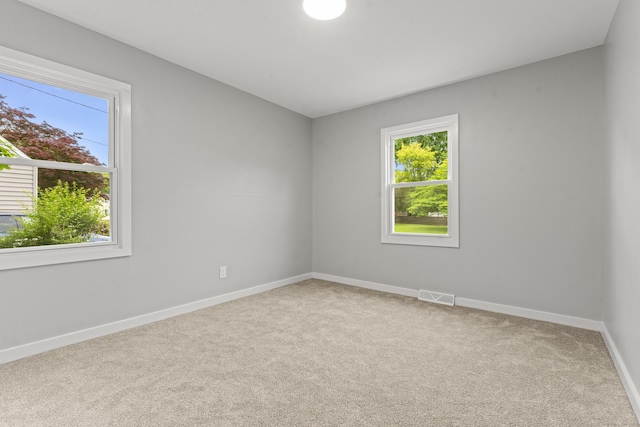 32 Porterbrook Ave, East Hartford, CT 06118 - empty room with healthy amount of natural light, carpet flooring, and baseboards