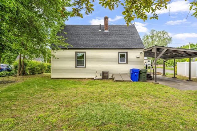 32 Porterbrook Ave, East Hartford, CT 06118 - back of house featuring roof with shingles, a chimney, and cooling unit