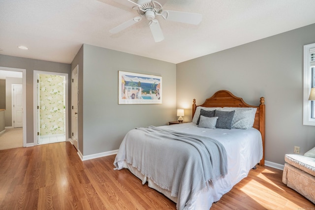 53 Bathcrescent Ln Unit 53, Bloomfield, CT 06002 - bedroom featuring light wood-type flooring, baseboards, a ceiling fan, and ensuite bathroom