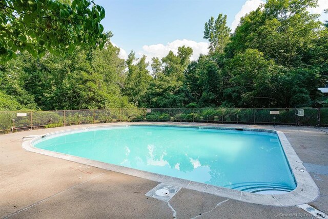 53 Bathcrescent Ln Unit 53, Bloomfield, CT 06002 - community pool featuring a patio