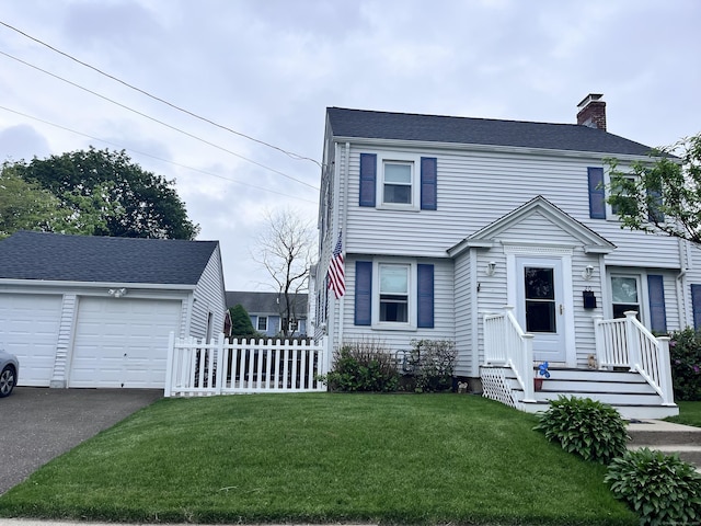 20 Elk Ter, Stratford, CT 06614 - colonial inspired home featuring a chimney, asphalt driveway, and an outbuilding
