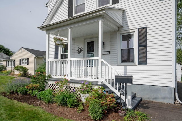 115 Ashland Ave, Newington, CT 06111 - property entrance with a porch