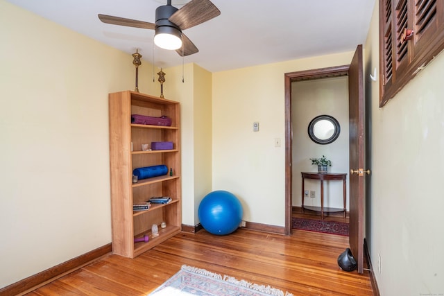 115 Ashland Ave, Newington, CT 06111 - exercise room featuring wood finished floors, baseboards, and ceiling fan