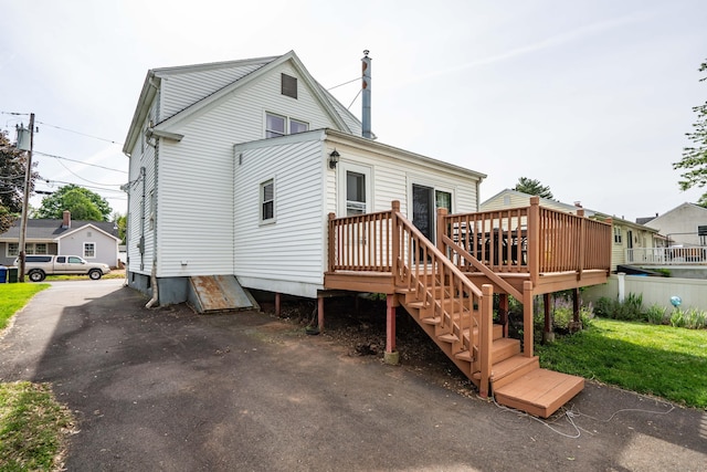 115 Ashland Ave, Newington, CT 06111 - rear view of property featuring a wooden deck and stairs