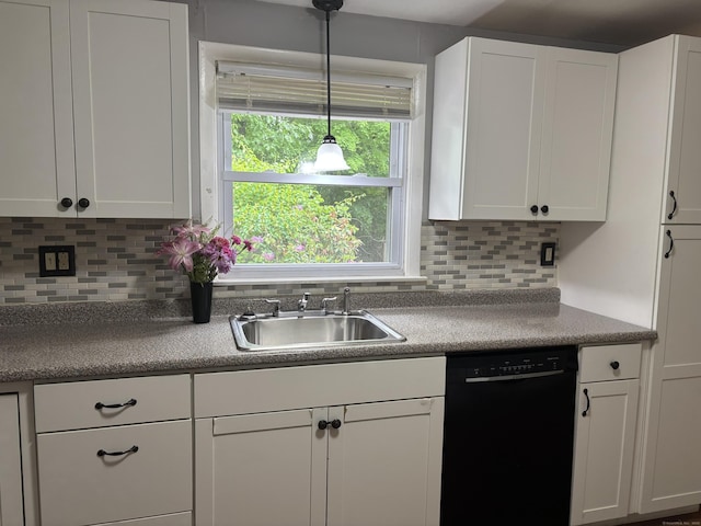 120 Wall St, Meriden, CT 06450 - kitchen featuring black dishwasher, a sink, white cabinetry, decorative backsplash, and decorative light fixtures