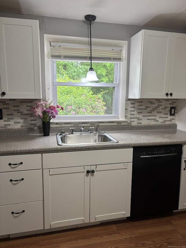 120 Wall St, Meriden, CT 06450 - kitchen featuring dishwasher, a sink, white cabinetry, decorative backsplash, and dark wood-type flooring