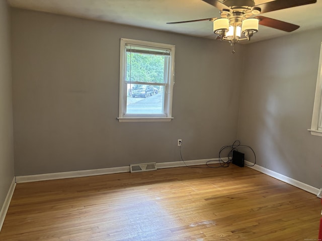 120 Wall St, Meriden, CT 06450 - unfurnished room with light wood-style floors, baseboards, and a ceiling fan