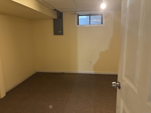 120 Wall St, Meriden, CT 06450 - below grade area featuring electric panel, dark colored carpet, and baseboards
