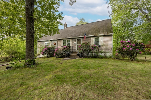 76 River St W, Old Saybrook, CT 06475 - cape cod home featuring a chimney and a front lawn