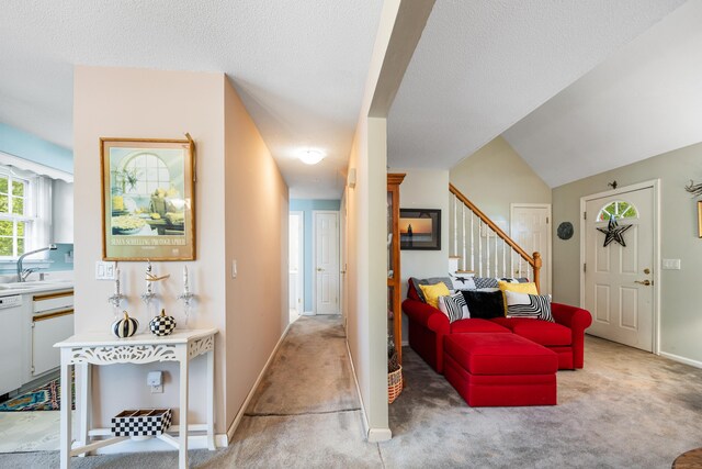76 River St W, Old Saybrook, CT 06475 - living room with light colored carpet, stairs, and a textured ceiling