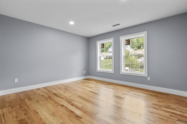 116 Joshua Town Rd, Waterbury, CT 06708 - unfurnished room with baseboards, wood finished floors, and recessed lighting