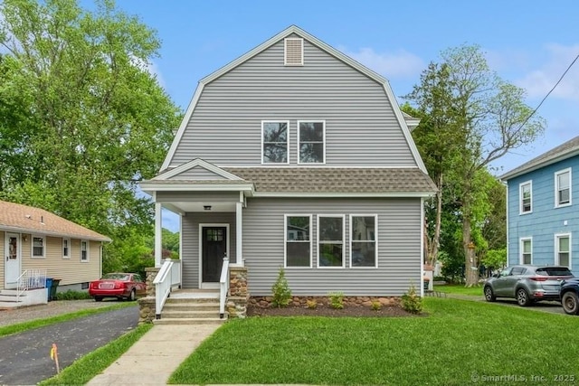 34 Wilbur Ave, Meriden, CT 06450 - dutch colonial with a gambrel roof, a front yard, and a shingled roof