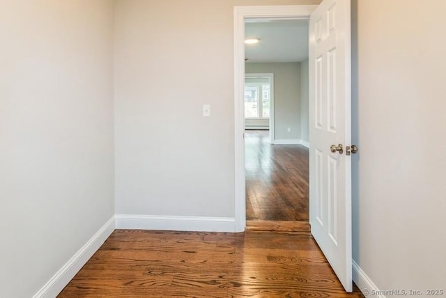 34 Wilbur Ave, Meriden, CT 06450 - spare room featuring wood finished floors, baseboards, and baseboard heating