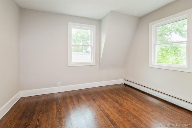 34 Wilbur Ave, Meriden, CT 06450 - spare room featuring a baseboard heating unit, healthy amount of natural light, hardwood / wood-style floors, and baseboards