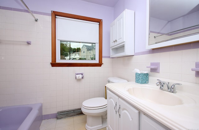 58 Wade St, West Haven, CT 06516 - bathroom with tile walls, vanity, toilet, and tile patterned floors