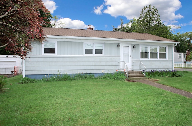 58 Wade St, West Haven, CT 06516 - view of front of home with a chimney and entry steps