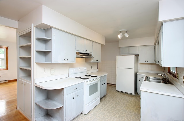 58 Wade St, West Haven, CT 06516 - kitchen with open shelves, white appliances, under cabinet range hood, a sink, and light floors