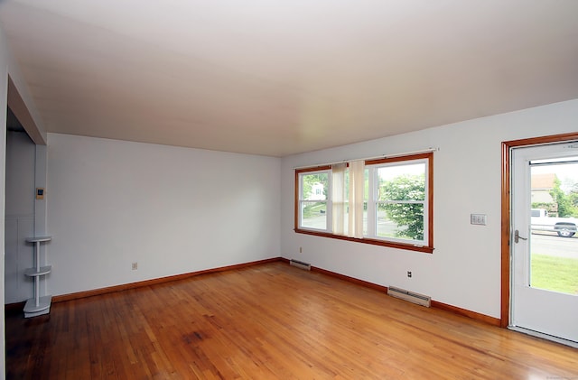 58 Wade St, West Haven, CT 06516 - empty room with light wood-type flooring and baseboards