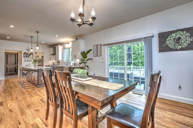 905 New Britain Ave, Farmington, CT 06032 - dining area with light wood-type flooring, a chandelier, baseboards, and recessed lighting
