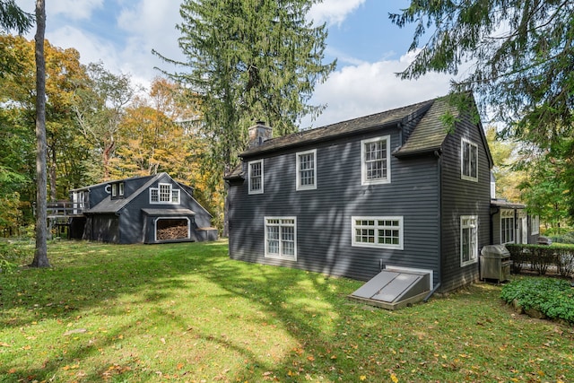 99 Cross Hwy, Redding, CT 06896 - back of property featuring a chimney and a lawn