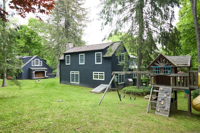 99 Cross Hwy, Redding, CT 06896 - back of house with a playground, a yard, and a chimney