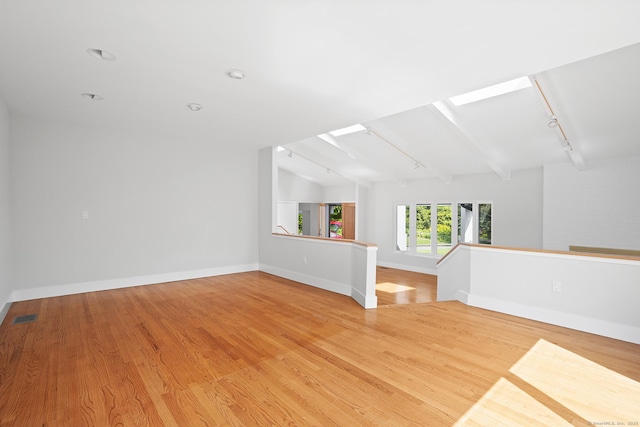 37 Topfield Rd, Wilton, CT 06897 - empty room with track lighting, light wood-style floors, and baseboards
