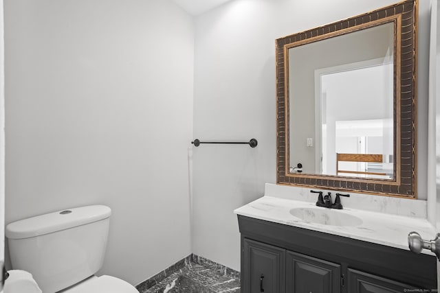 37 Topfield Rd, Wilton, CT 06897 - half bath with toilet, vanity, and marble finish floors