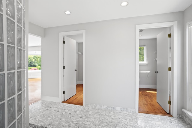 37 Topfield Rd, Wilton, CT 06897 - corridor with plenty of natural light, wood finished floors, recessed lighting, and baseboards