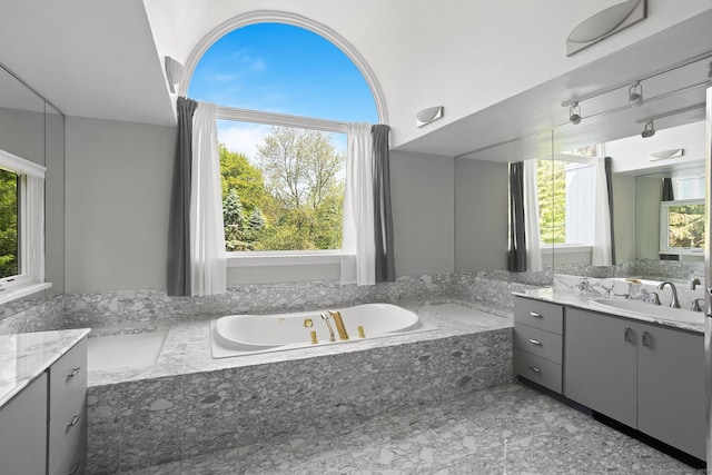 37 Topfield Rd, Wilton, CT 06897 - full bath featuring vanity, plenty of natural light, and a tub with jets