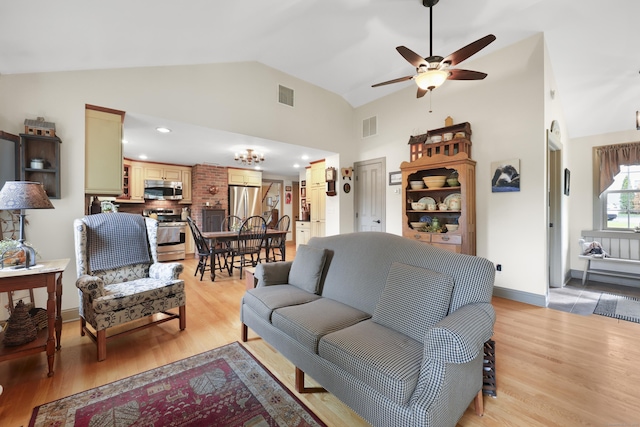 50 Clinton St, Glastonbury, CT 06033 - living area with ceiling fan, light wood-type flooring, and high vaulted ceiling