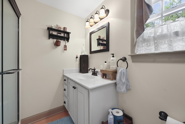 50 Clinton St, Glastonbury, CT 06033 - bathroom featuring vanity and wood finished floors