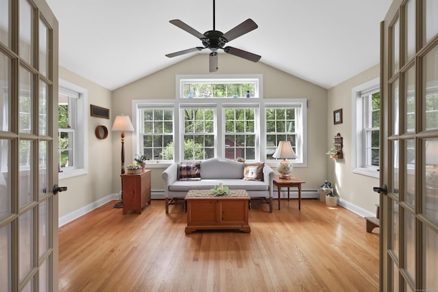 50 Clinton St, Glastonbury, CT 06033 - sunroom / solarium featuring a baseboard radiator, plenty of natural light, vaulted ceiling, and french doors