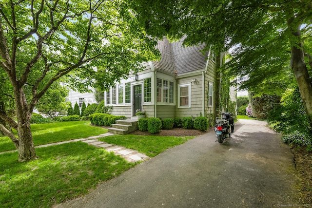 19 Bryan Rd, Norwalk, CT 06853 - view of front facade featuring a shingled roof and a front lawn