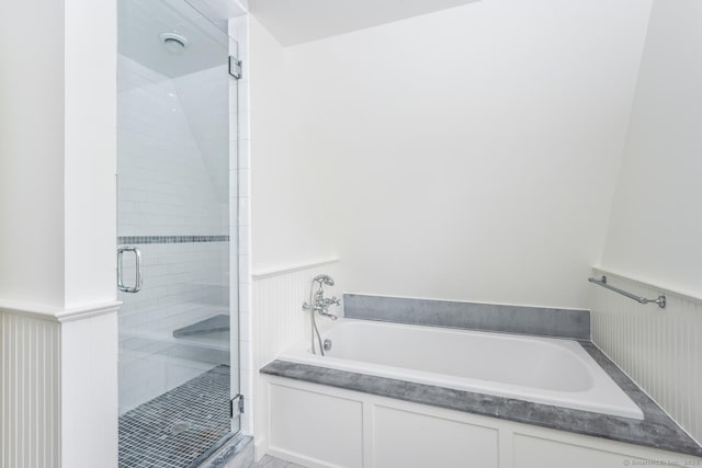 19 Bryan Rd, Norwalk, CT 06853 - bathroom featuring a garden tub, a shower stall, and wainscoting