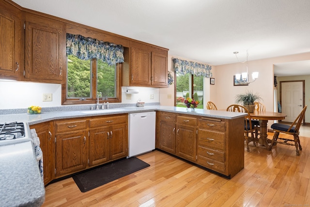 132 Royal Oak Dr, Southington, CT 06489 - kitchen featuring white appliances, a sink, a peninsula, and light wood-style floors