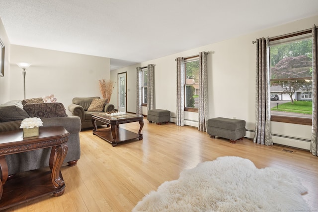 132 Royal Oak Dr, Southington, CT 06489 - living area with light wood finished floors and plenty of natural light