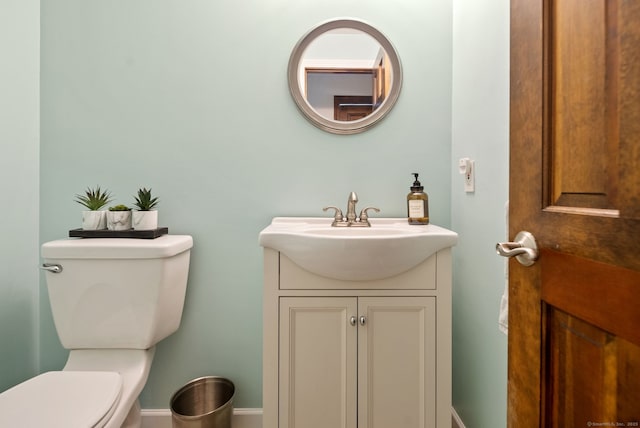 132 Royal Oak Dr, Southington, CT 06489 - bathroom featuring toilet, vanity, and baseboards