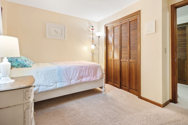 132 Royal Oak Dr, Southington, CT 06489 - carpeted bedroom featuring a closet and baseboards