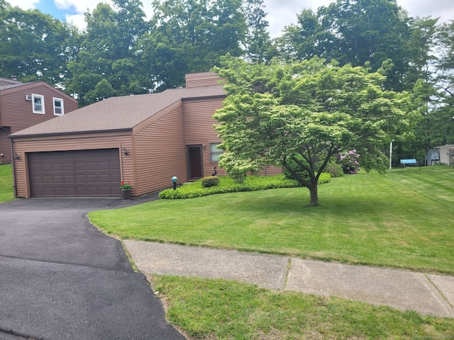 13 Little River Ln, Middletown, CT 06457 - view of front facade with a garage, a front yard, driveway, and roof with shingles