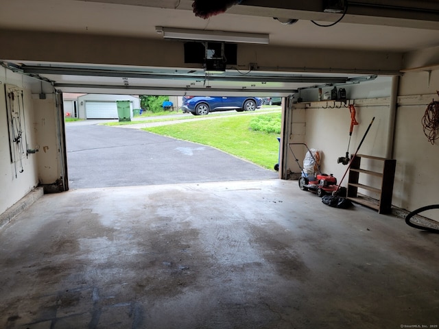 13 Little River Ln, Middletown, CT 06457 - garage featuring a garage door opener