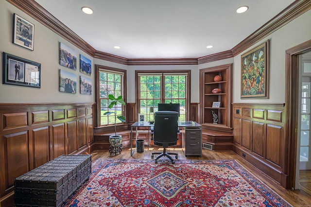 134 Nod Rd, Ridgefield, CT 06877 - home office with wood finished floors, ornamental molding, recessed lighting, built in shelves, and wainscoting