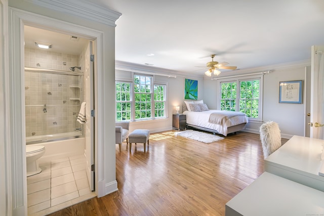 134 Nod Rd, Ridgefield, CT 06877 - bedroom featuring ornamental molding, baseboards, ensuite bath, wood finished floors, and a ceiling fan