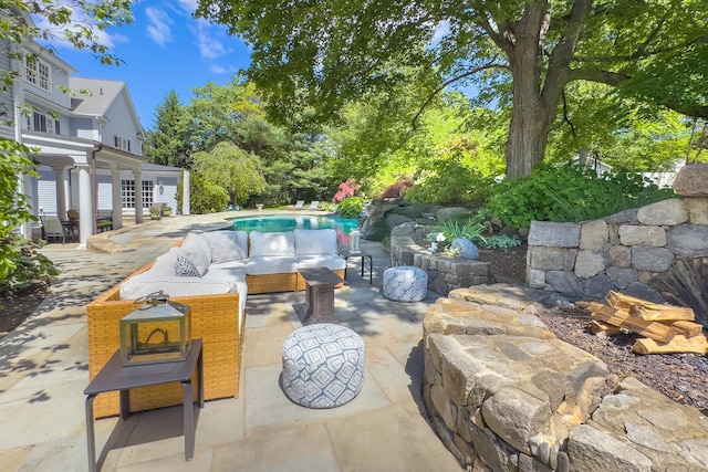134 Nod Rd, Ridgefield, CT 06877 - view of patio / terrace with an outdoor pool and an outdoor living space
